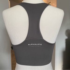 Alphalete Grey Small cropped Bra workout top. Cries cross / racerback style.